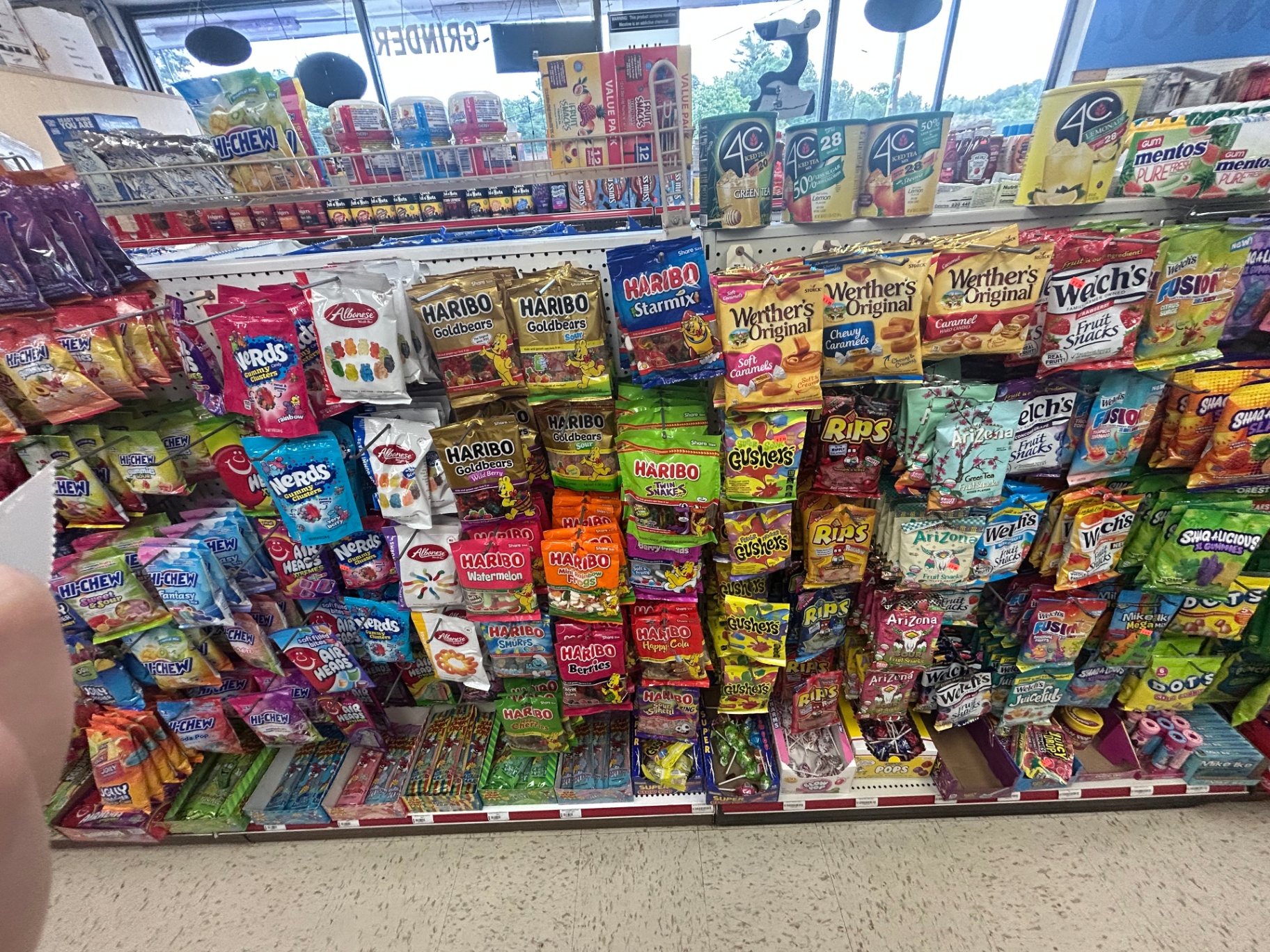 Snack & candy aisle with Haribo, Nerds, Hi-Chew, Welch's, Gushers and more